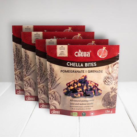 4 pack of pomegranate walnut Chella Bites. Red packaging with pomegranate images, labeled 136g, all-natural, no artificial additives.