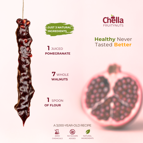 Walnut Pomegranate Chella Churchkhela with juiced pomegranate, walnuts, flour; healthy Georgian dessert with natural ingredients
