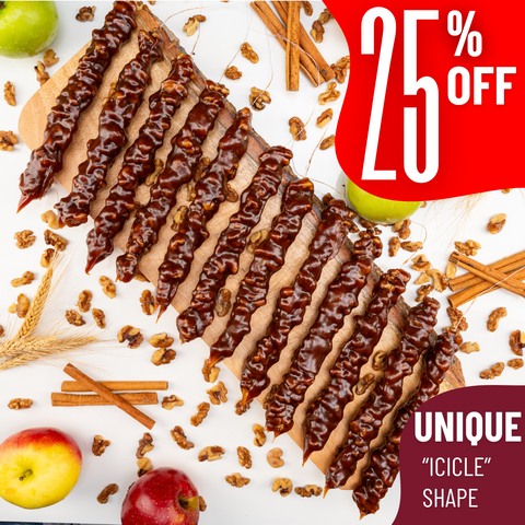 Apple Pie Walnut Chella Churchkhela with 25% off, arranged uniquely with apples and walnuts on a wooden board.
