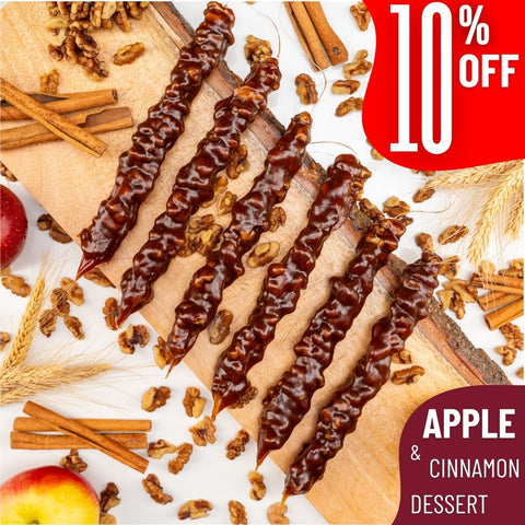 Apple Pie Walnut Chella Churchkhela dessert sticks with cinnamon, walnuts, and apple slices, featuring a 10% discount offer.
