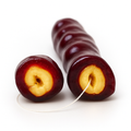Grape Hazelnut Chella Churchkhela with visible nut filling, a natural sweet treat made from grape juice and hazelnuts on a white background.
